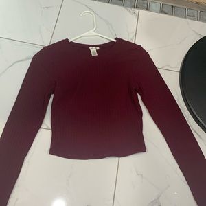 Maroon colored long sleeve shirt
